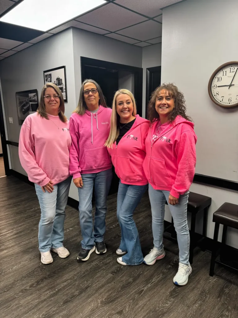 Palmer employees wearing pink at Kenworth of Indianapolis West