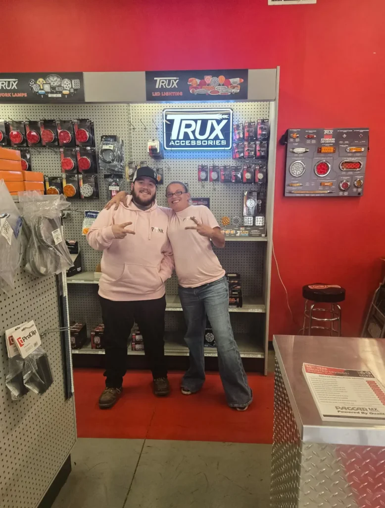 Palmer employees wearing pink at Kenworth of Terre Haute